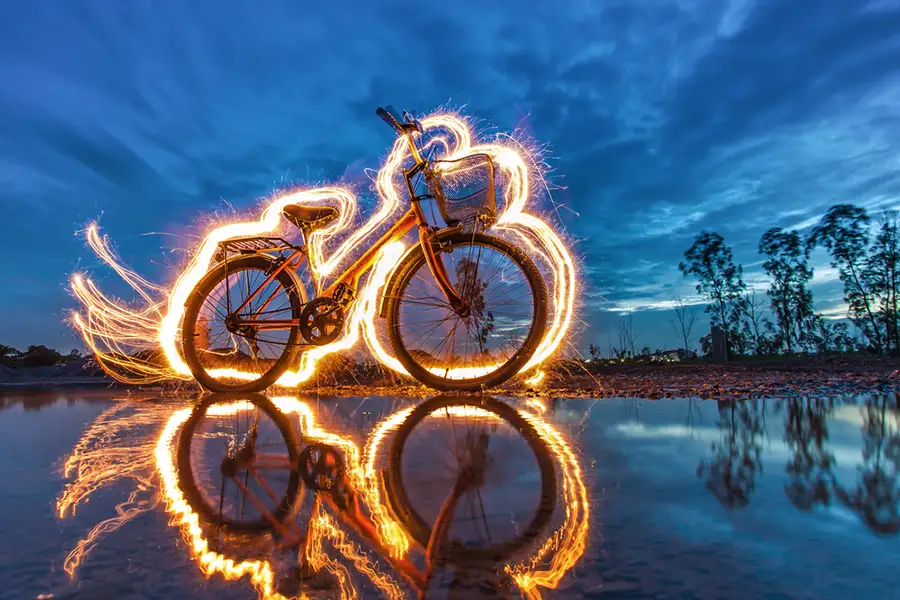 A light-painting photograph &mdash; a torch traced through a long exposure to draw with light.